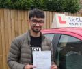 Kumail with Driving test pass certificate